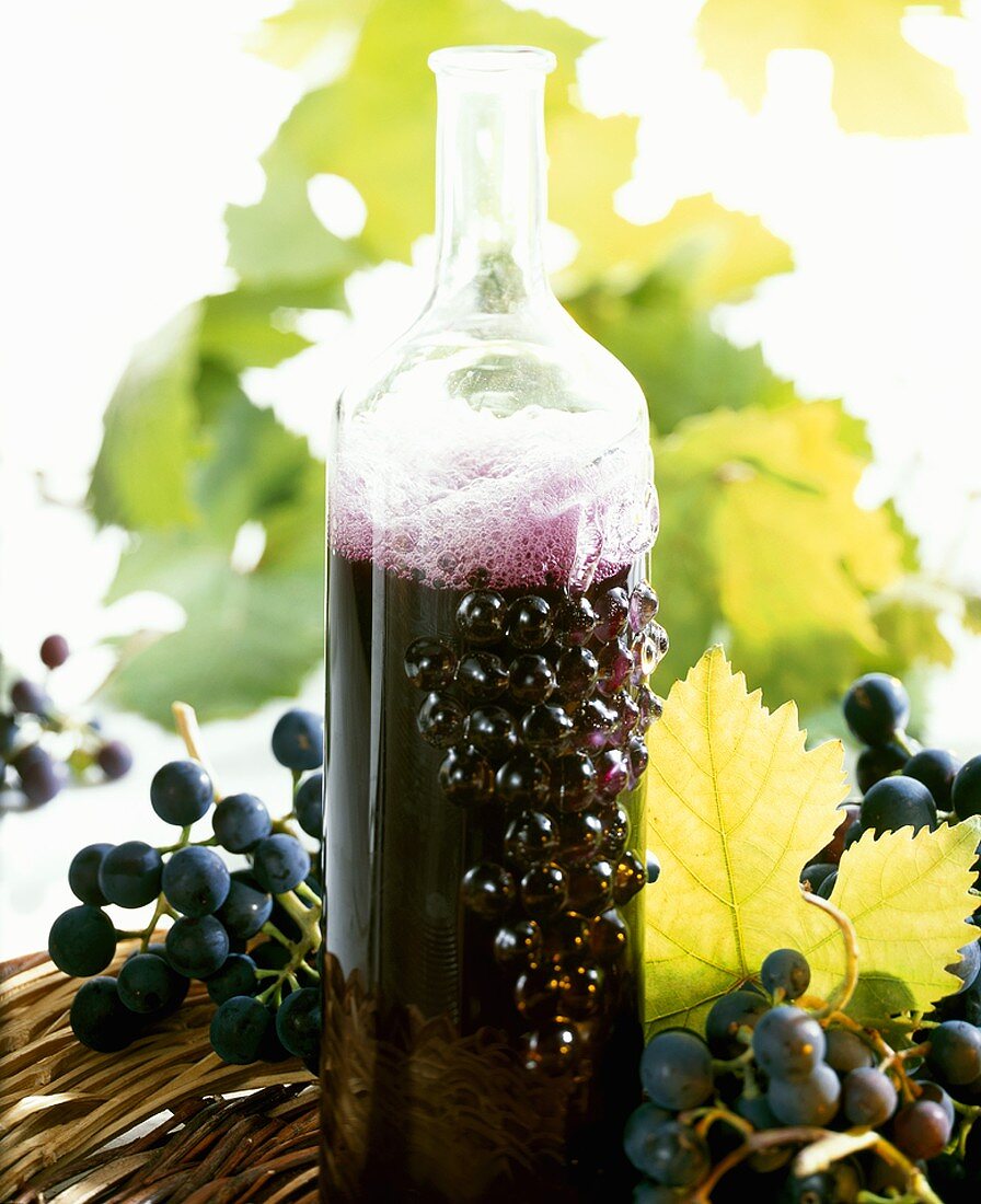 A bottle of red grape juice