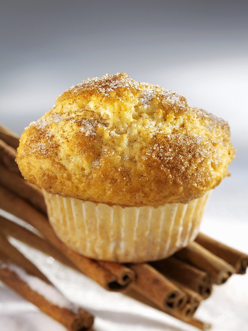 Muffin sprinkled with sugar and cinnamon