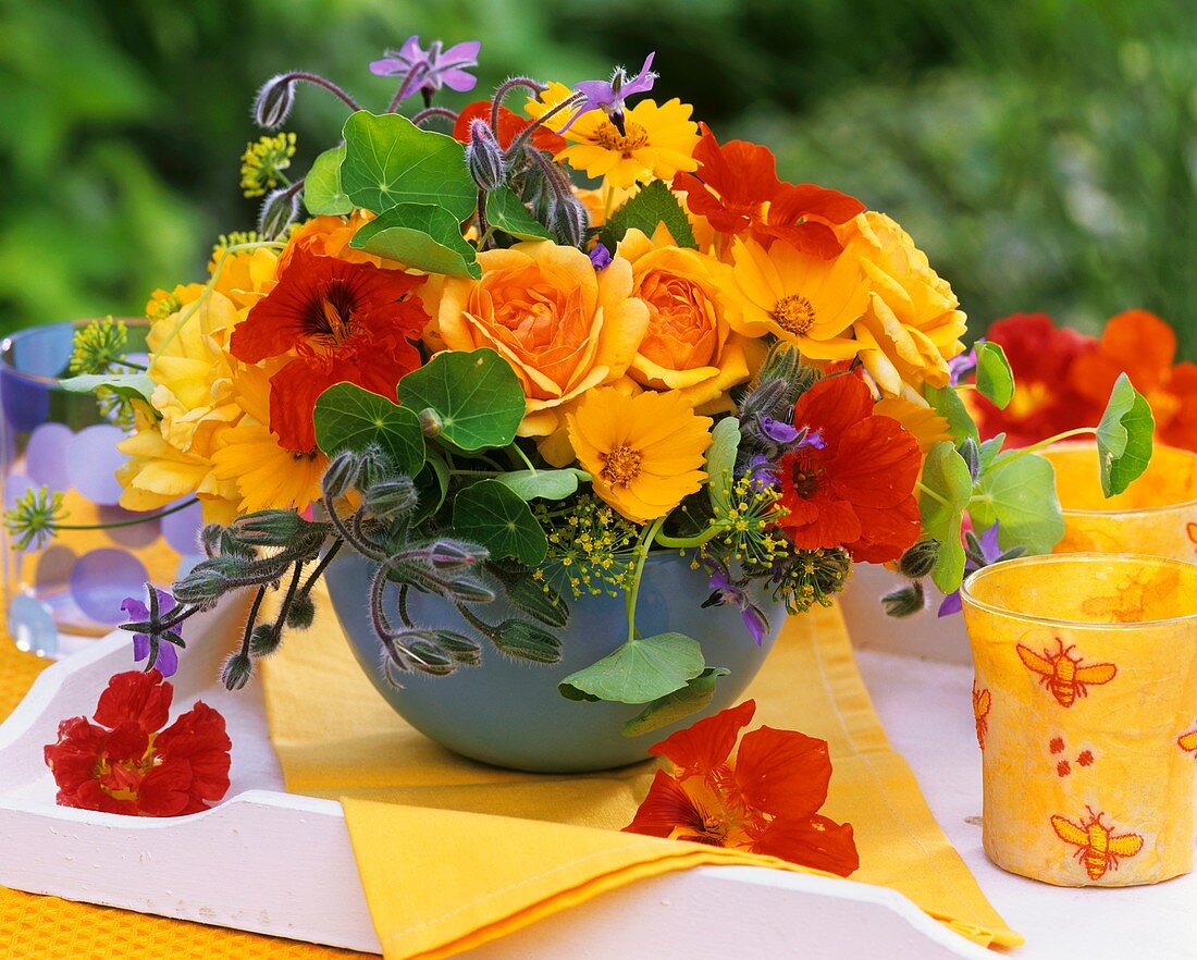 Arrangement of roses, nasturtiums and borage