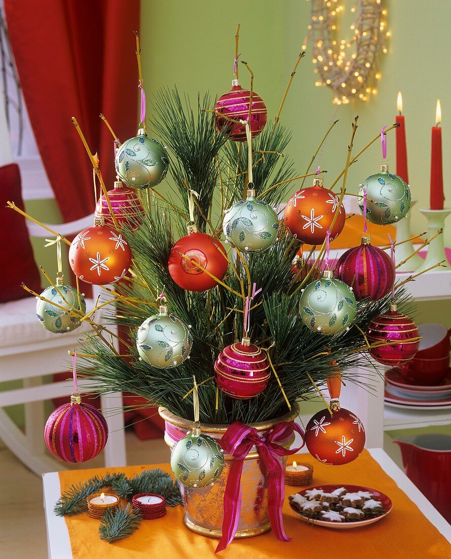 Arrangement of pine, dogwood and Christmas baubles