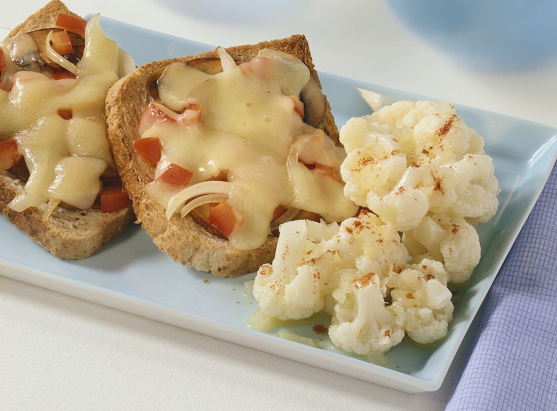Cheese on toast with cauliflower salad
