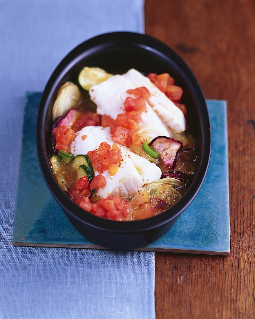 Oven-baked cod in vegetables