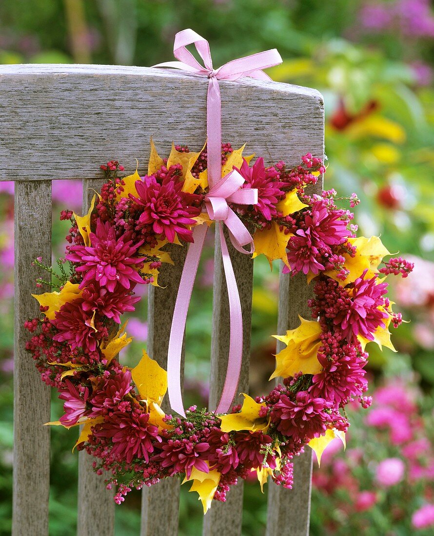 Wreath of chrysanthemums, heather and maple leaves