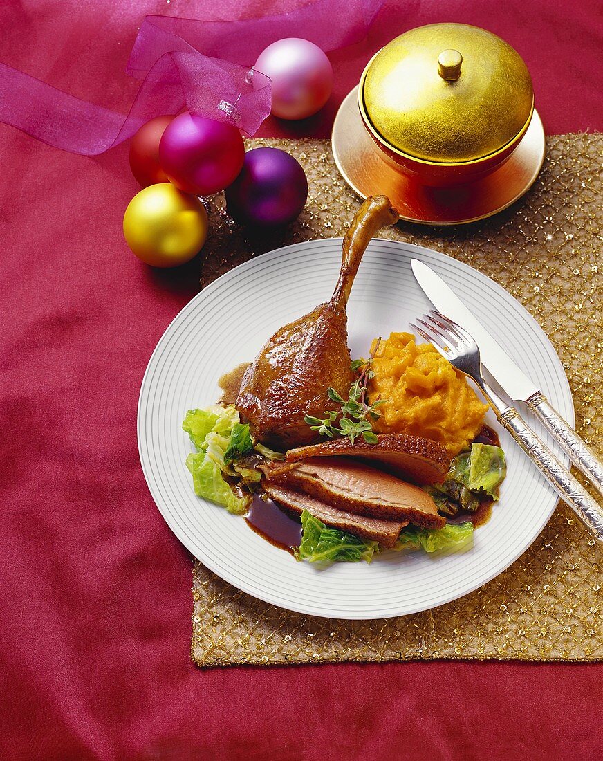 Roast goose with pumpkin puree and savoy cabbage