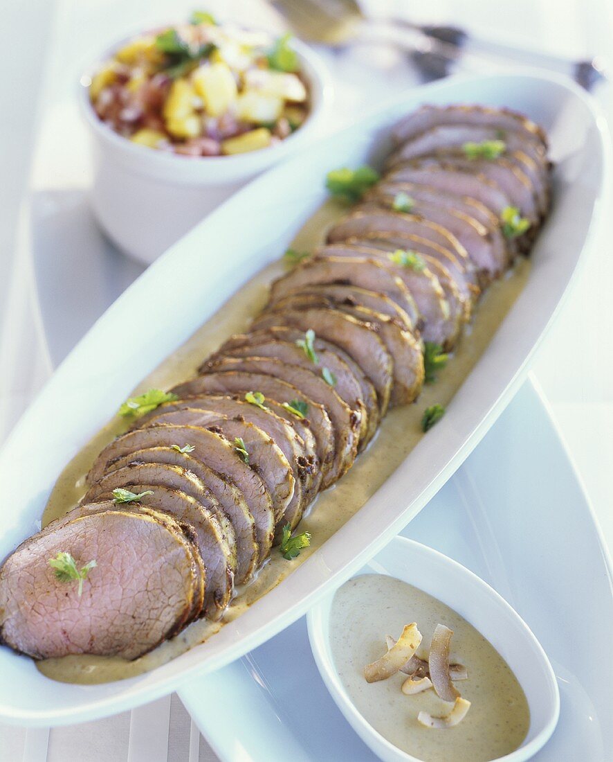 Roast veal with coconut sauce and mango salsa
