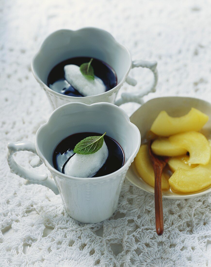 Elderberry soup with snow dumplings (poached meringue) & apple