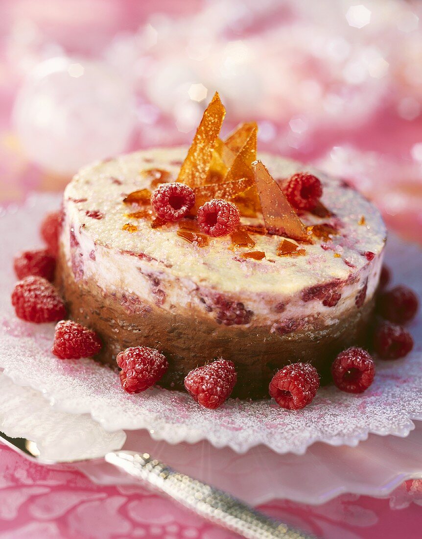 Raspberry chocolate cake with caramel decoration
