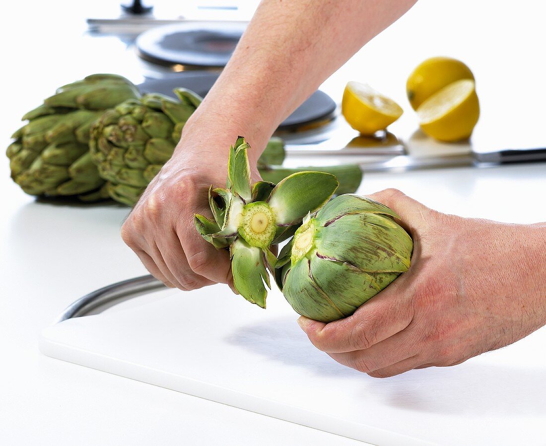 Removing the stalk from an artichoke