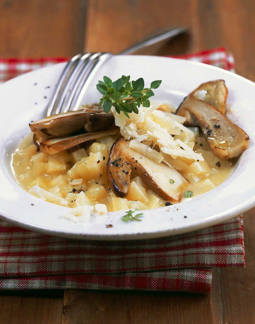 Fried ceps on potato risotto