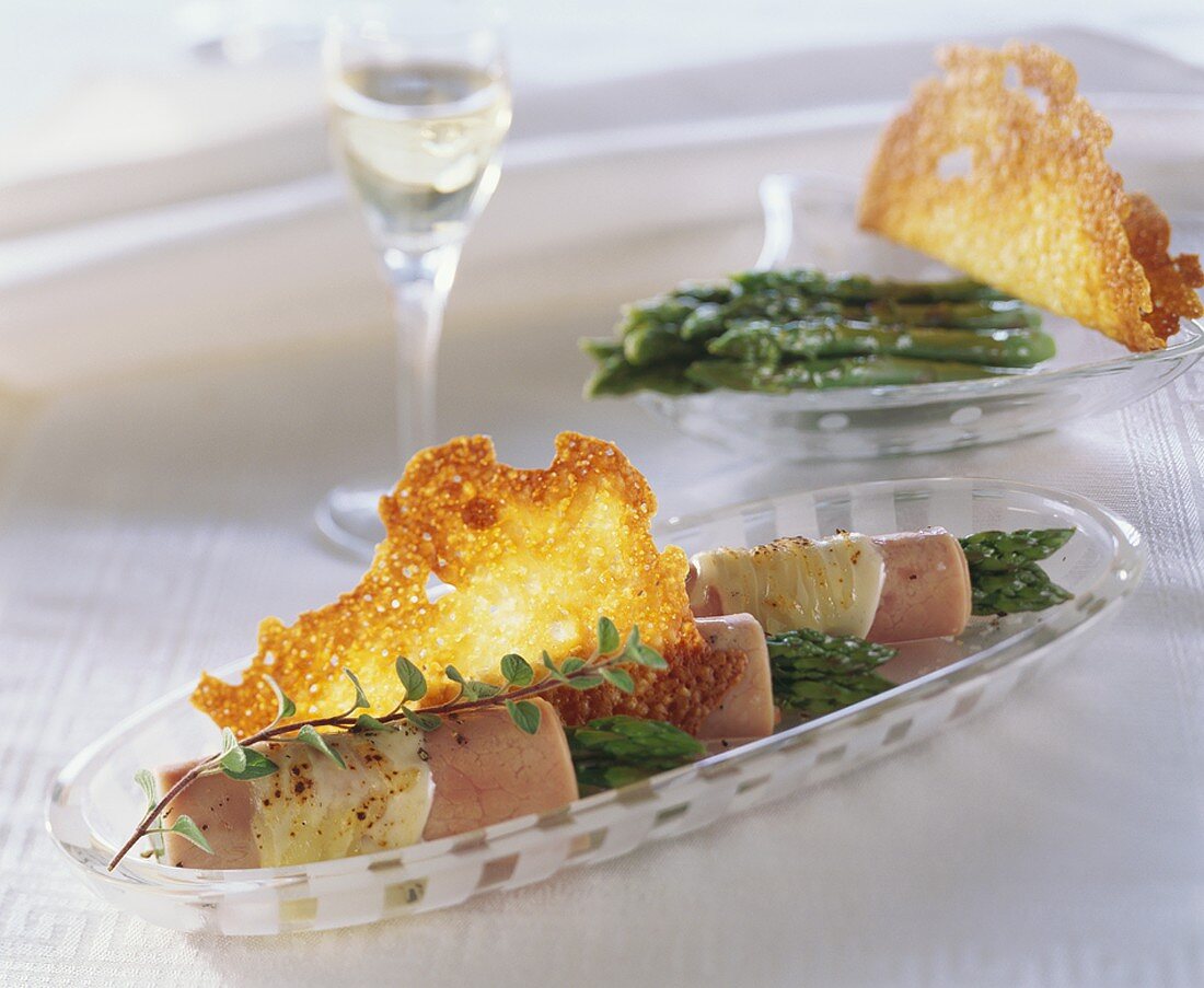 Ham and asparagus rolls with Parmesan crisps