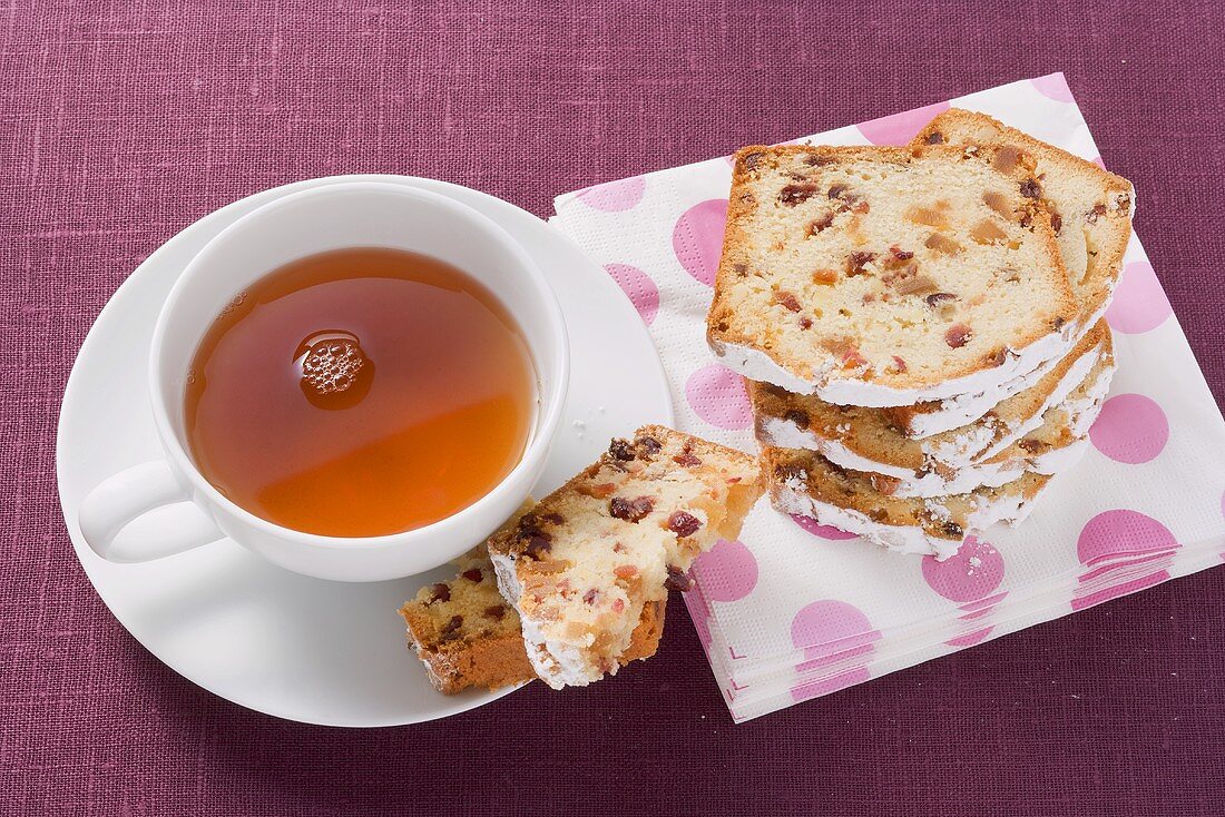 Slices of fruit loaf and a cup of tea