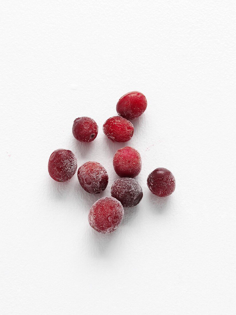 Several frozen cranberries