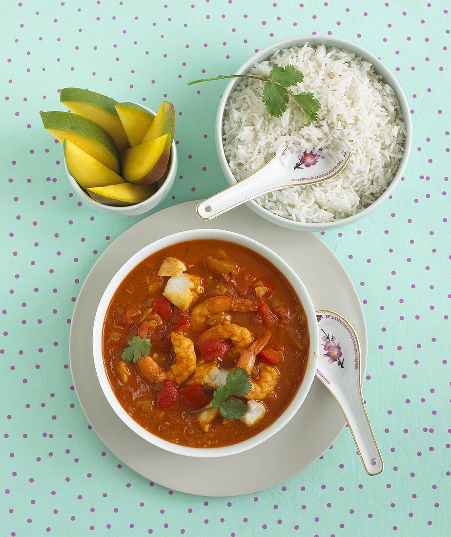 Fish curry with mango and rice