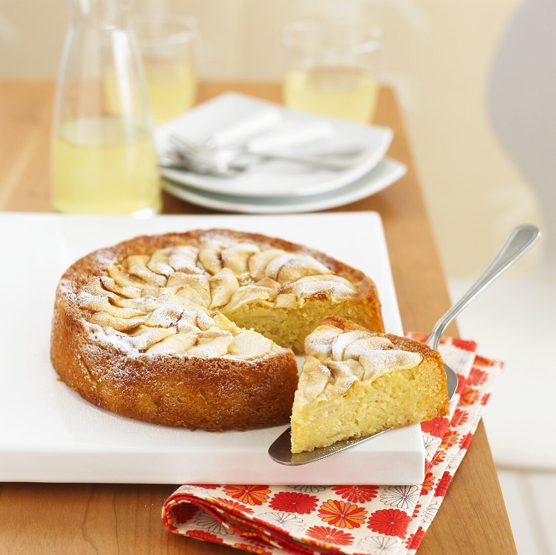 Apple and almond cake, a piece cut