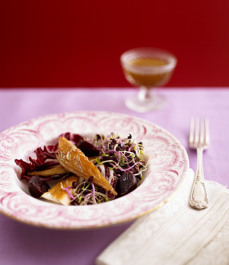 Beetroot salad with sprouts, radicchio and smoked mackerel
