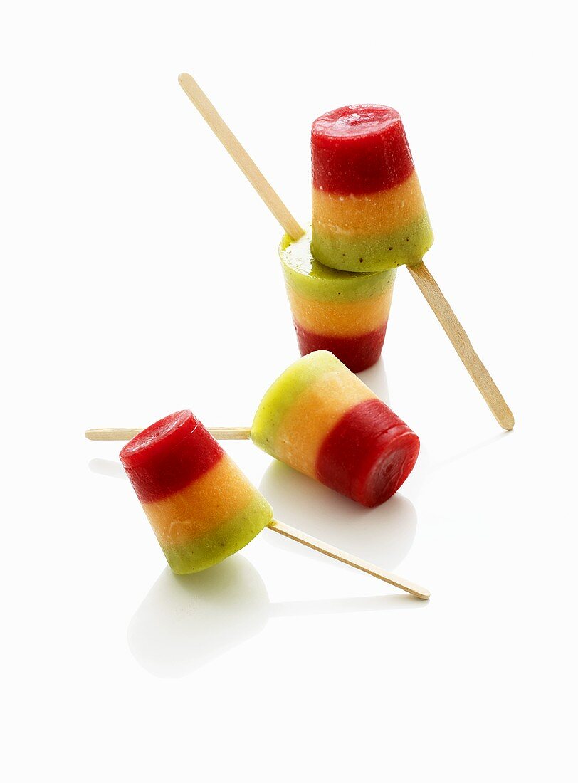 Colourful striped ice lollies