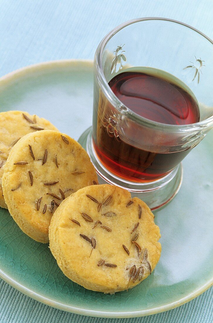 Cheese and caraway biscuits with a glass of port wine