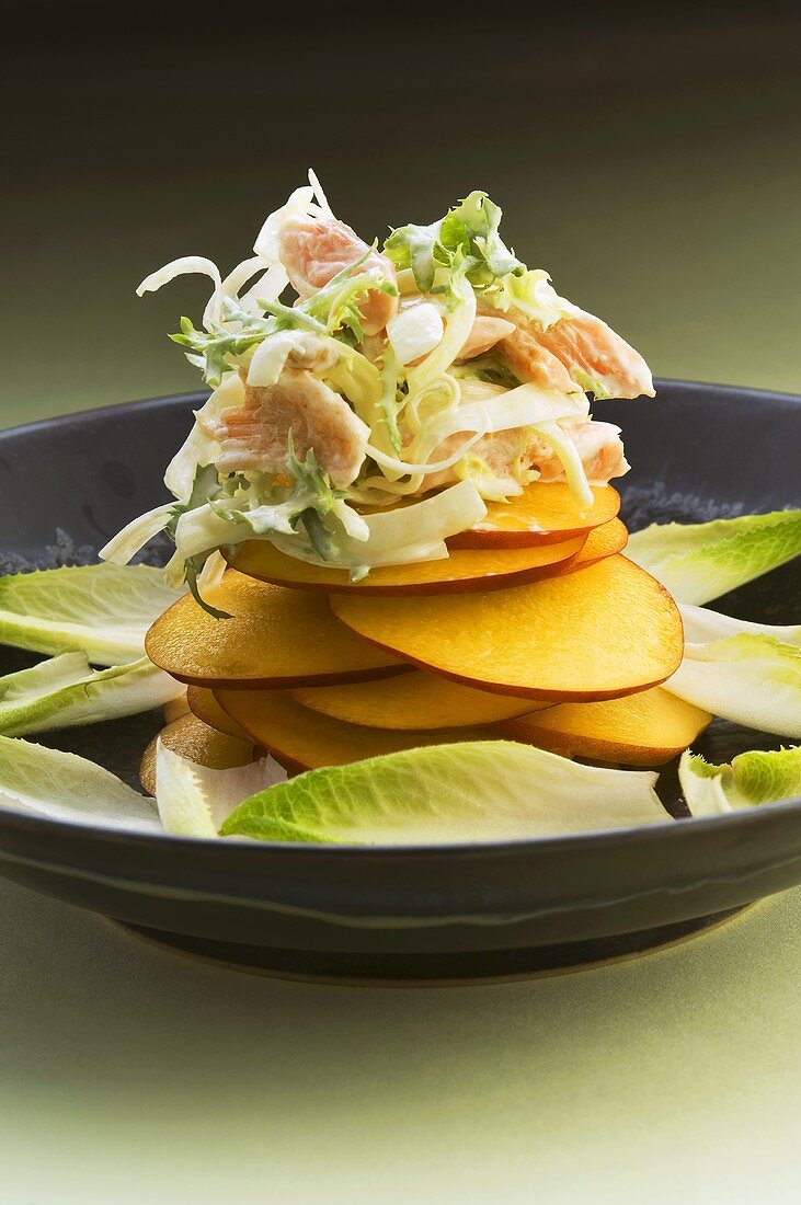 Smoked trout salad on slices of nectarine