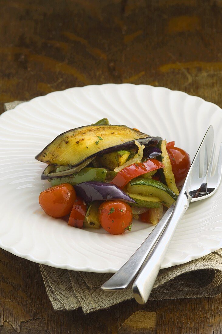 Ratatouille on plate with knife and fork