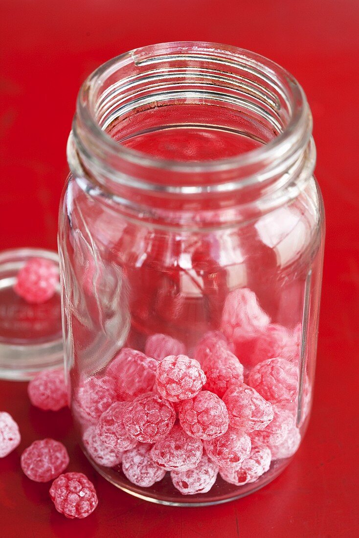 Raspberry sweets in sweet jar