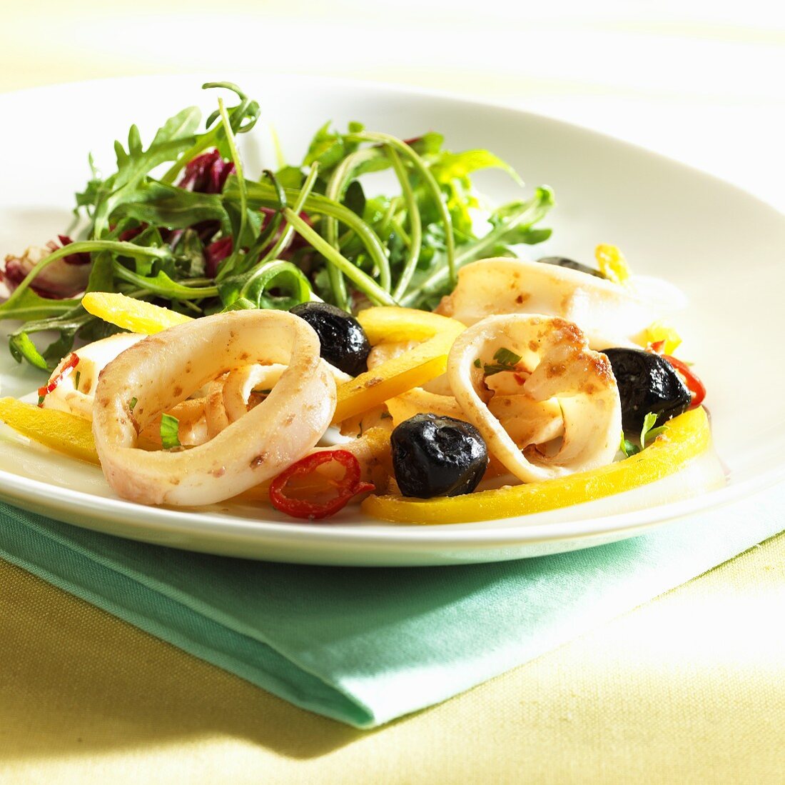 Squid salad with olives and peppers