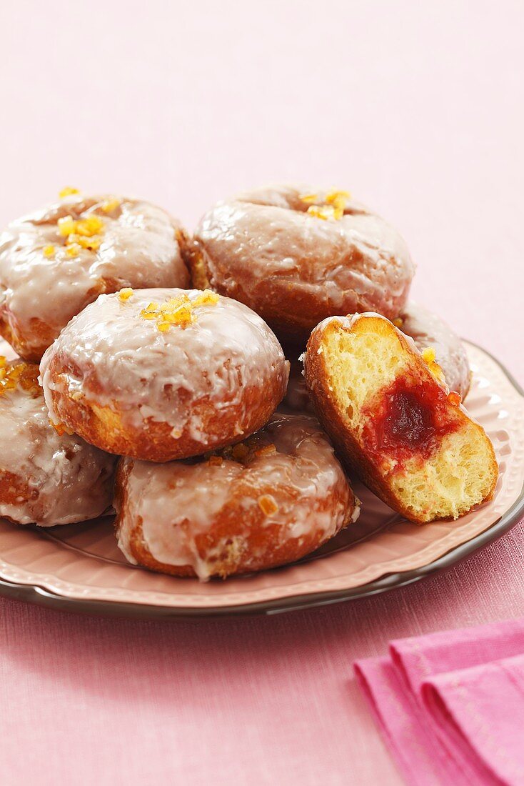 Iced doughnuts with rose jam