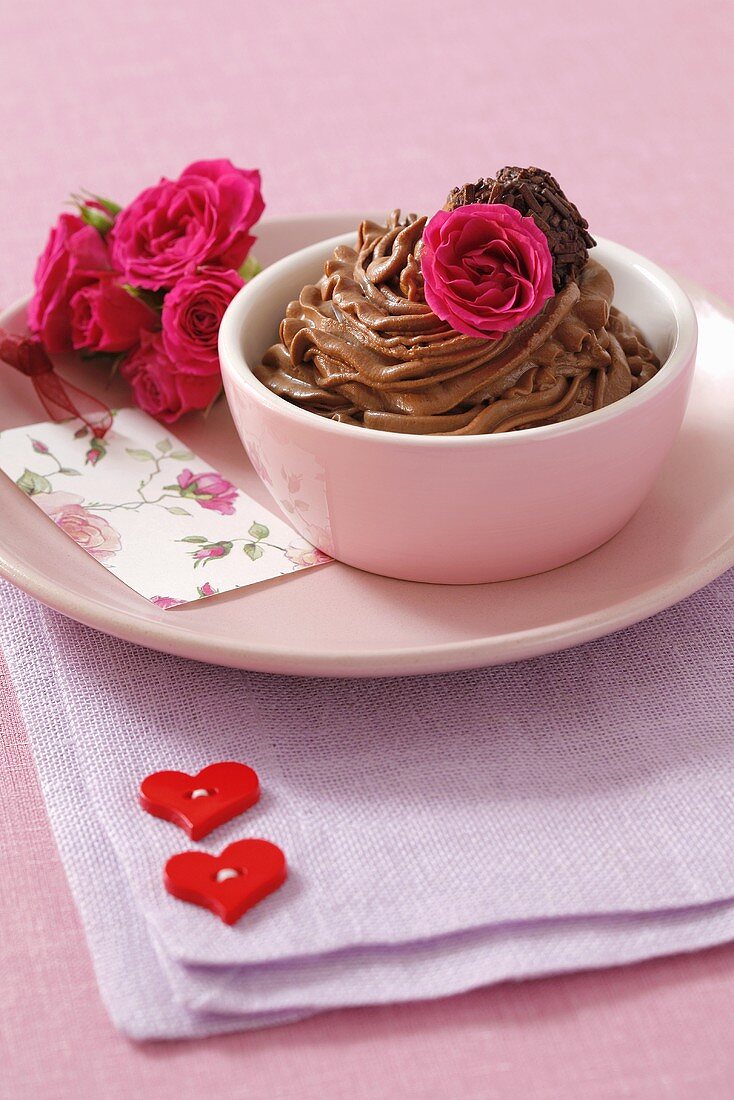 Chocolate mousse with roses and chocolate truffle