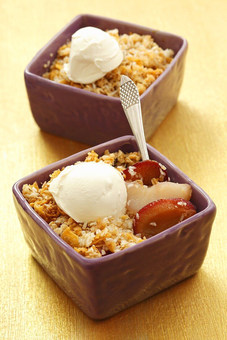 Plums and pears with cornflake and coconut crumble and mascarpone