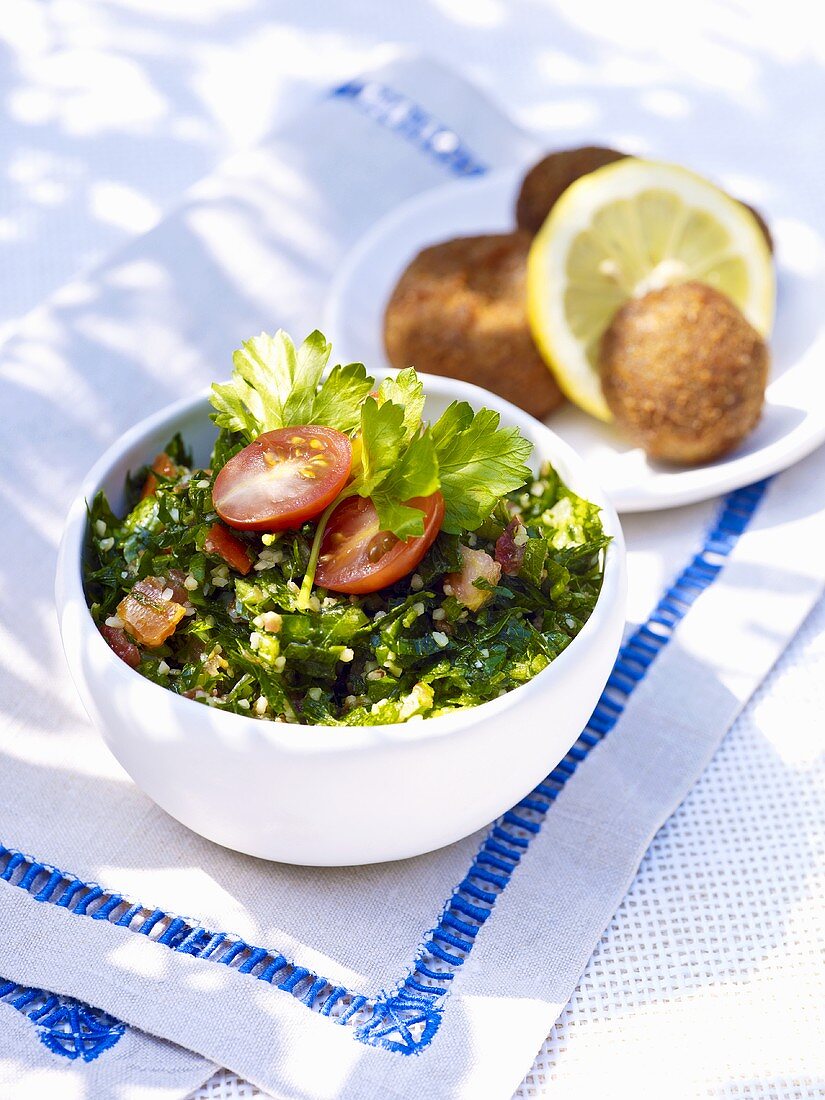 Parsley salad with couscous, croquettes