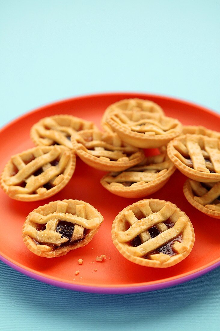 Raspberry tarts with pastry lattice