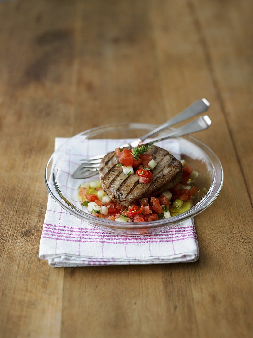 Grilled tuna with tomato and melon salsa