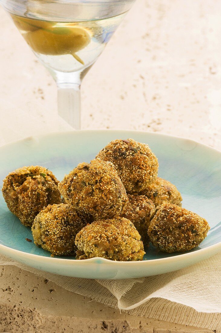 Deep-fried sardine balls and Martini