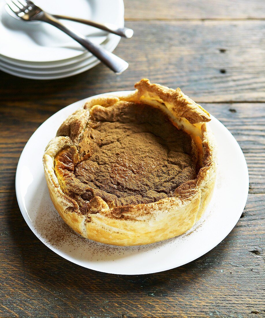 South African melktert (milk tart) with cinnamon