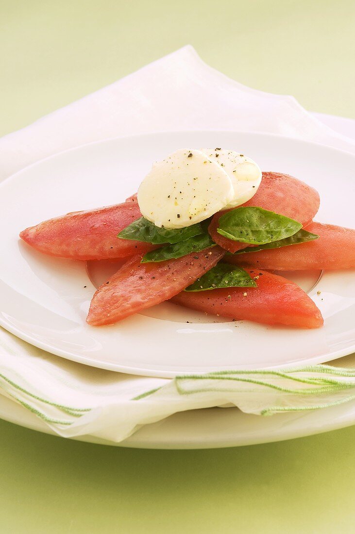 Tomatoes with mozzarella and basil