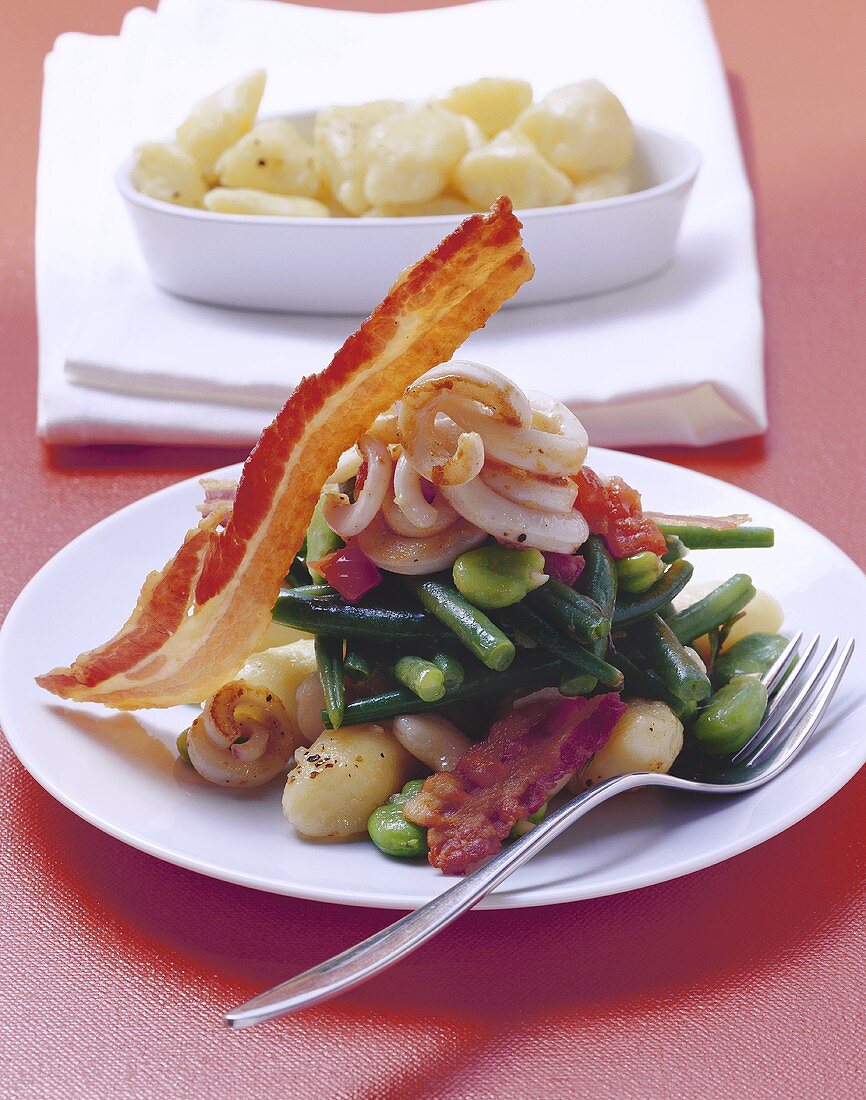 Calamari with beans and bacon