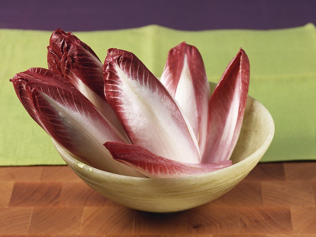 Red chicory leaves in a dish