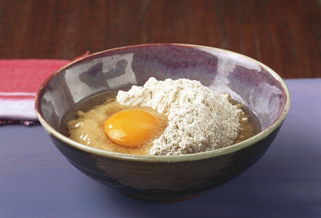 Flour and egg in a bowl
