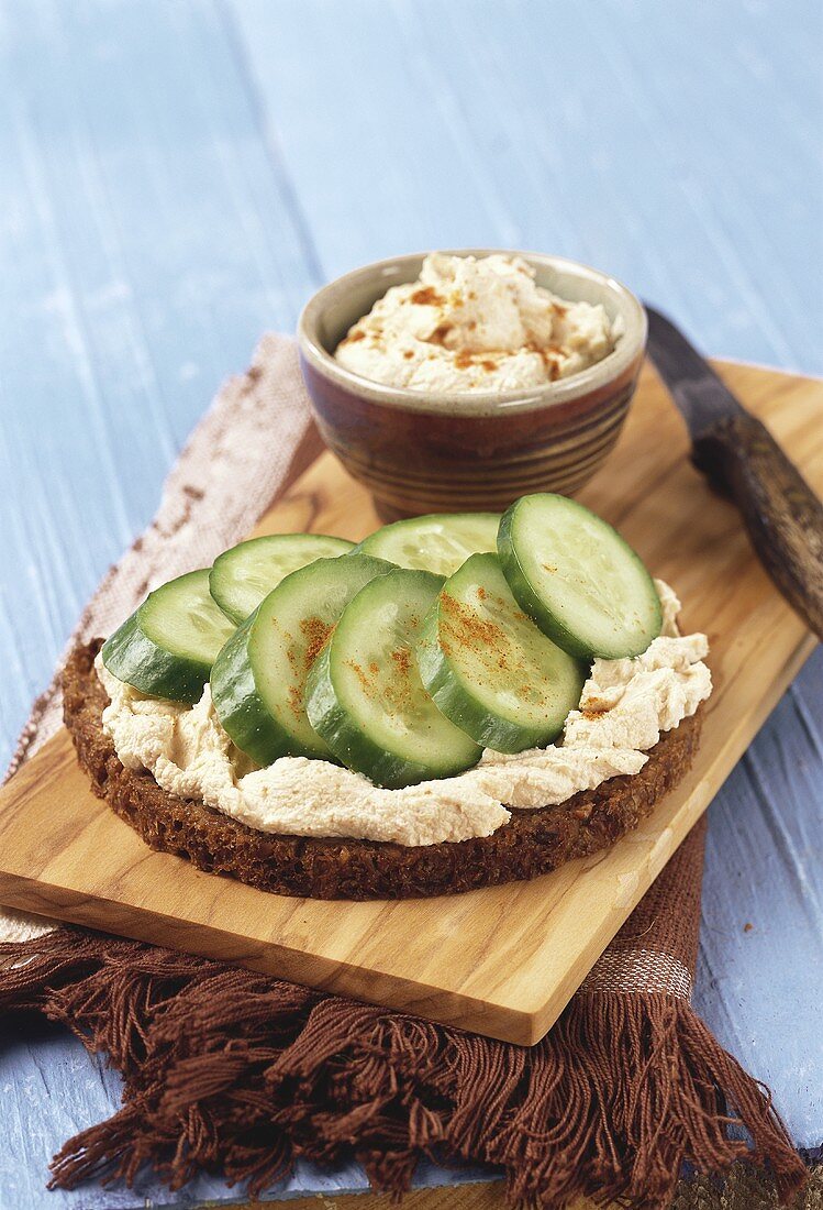 Peanut butter and cucumber on bread