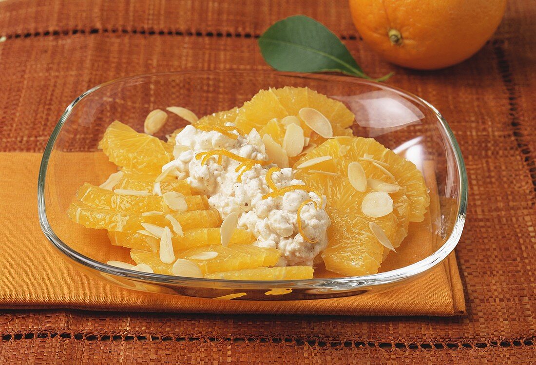 Dish of sliced oranges with almonds