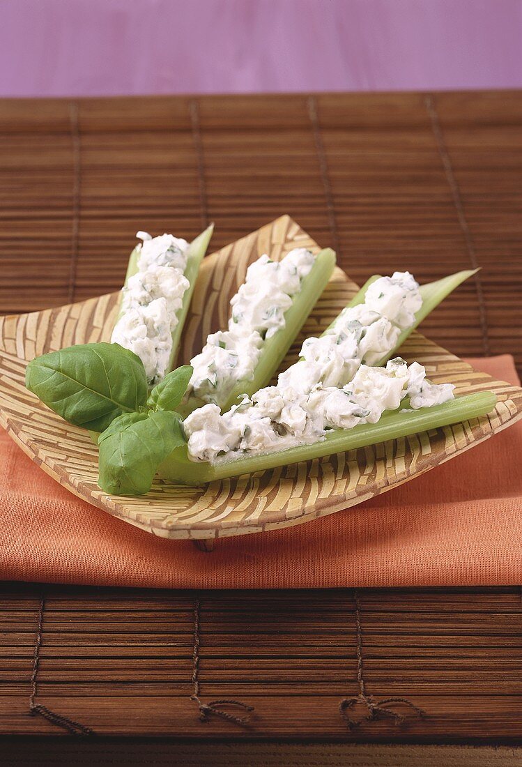 Celery with cheese and basil