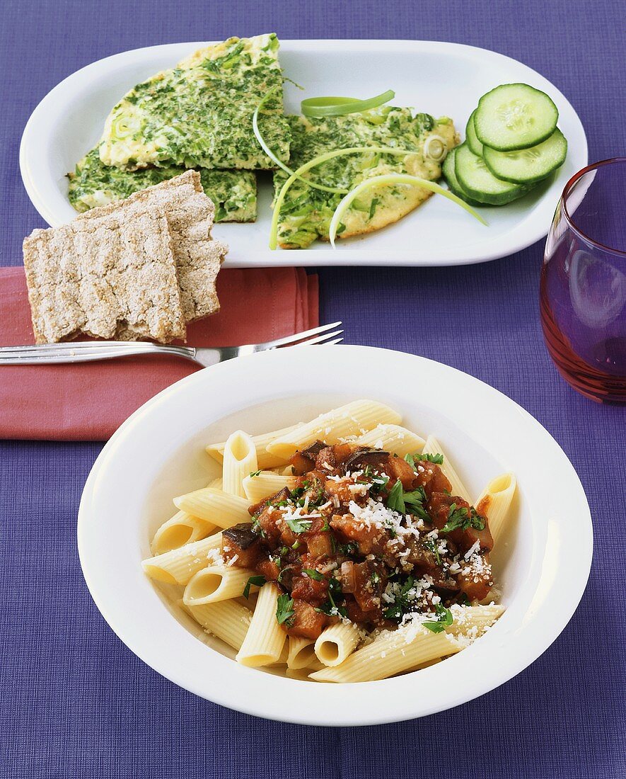 Pasta with aubergines and green frittata