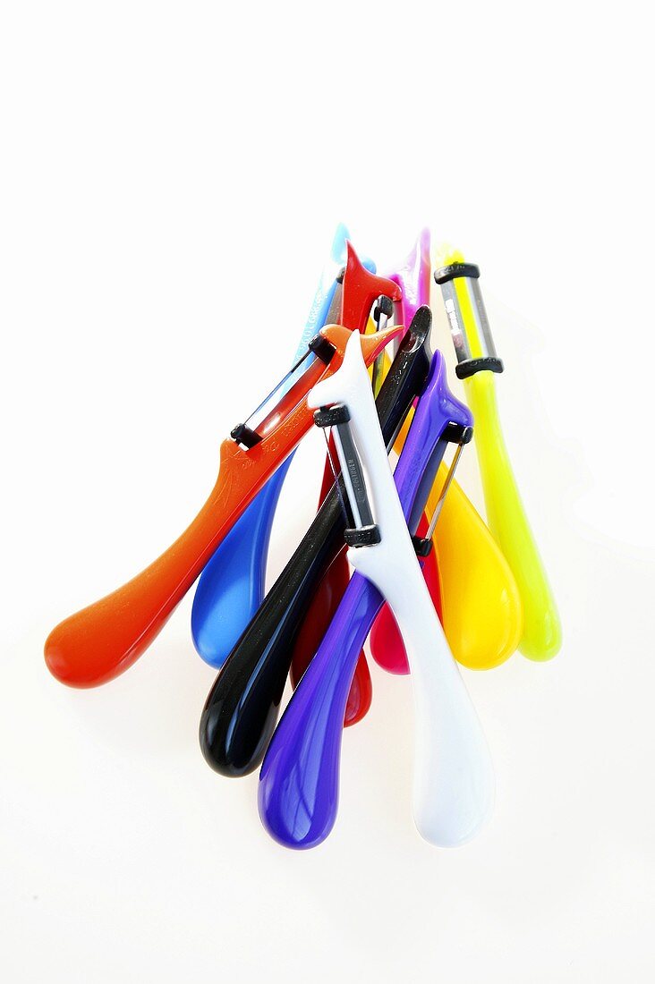 Several coloured vegetable peelers