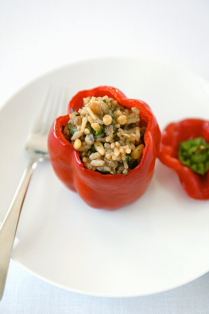 Red pepper stuffed with lamb, rice and pine nuts