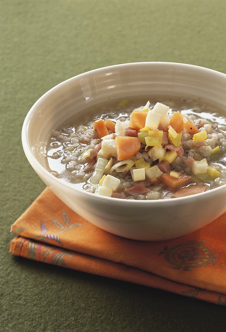 Barley soup with vegetables and bacon