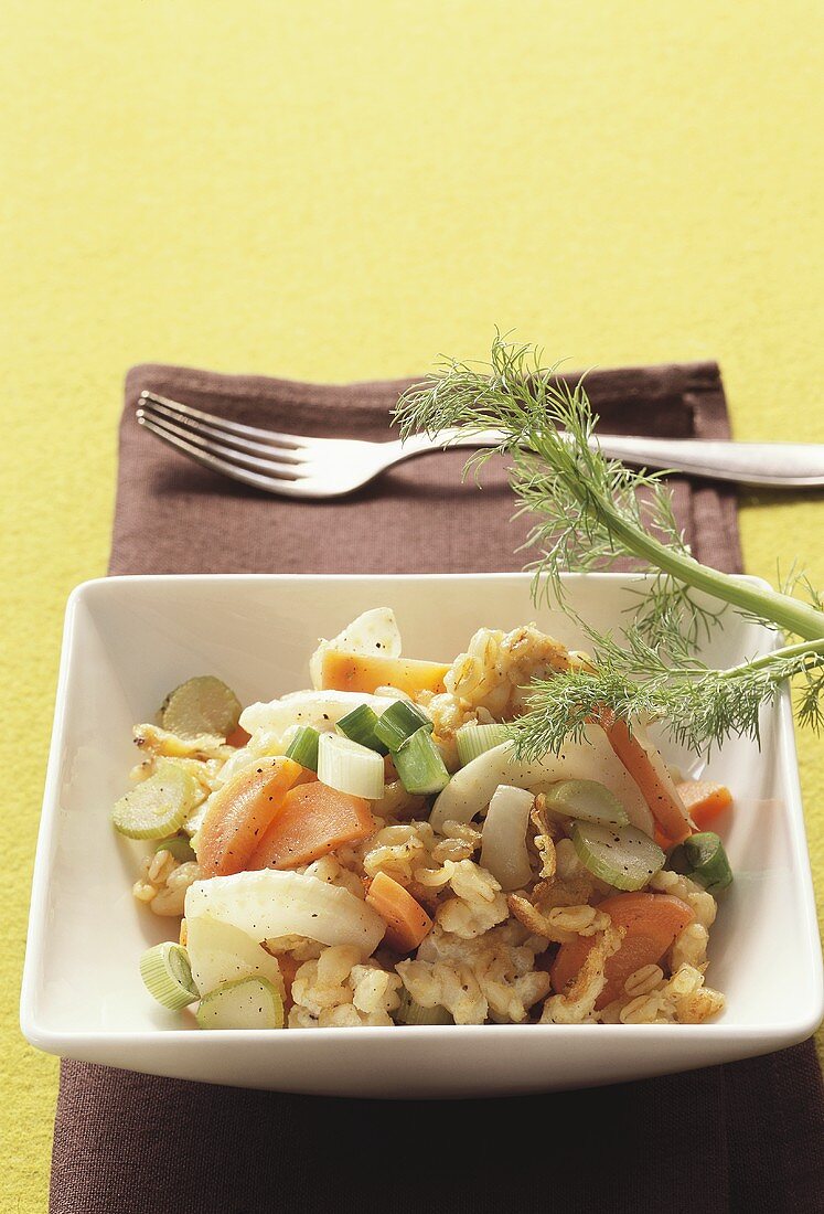 Cooked wheat with vegetables and egg