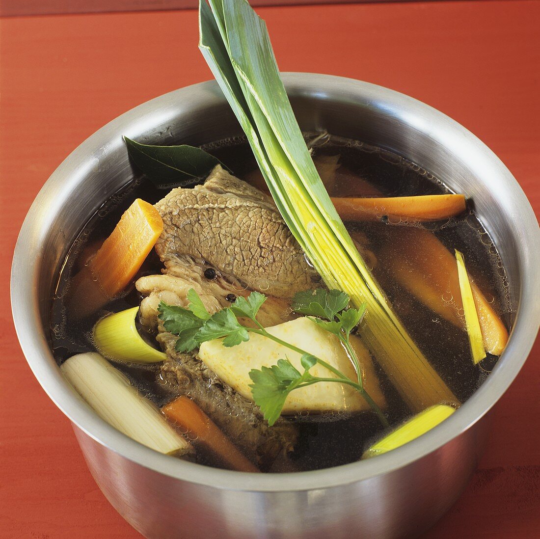 Meat broth with soup vegetables