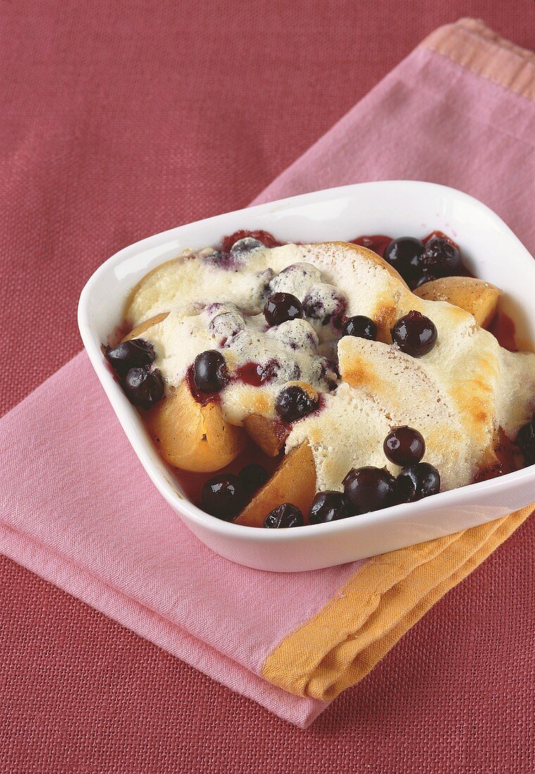 Apricot and blackcurrant gratin