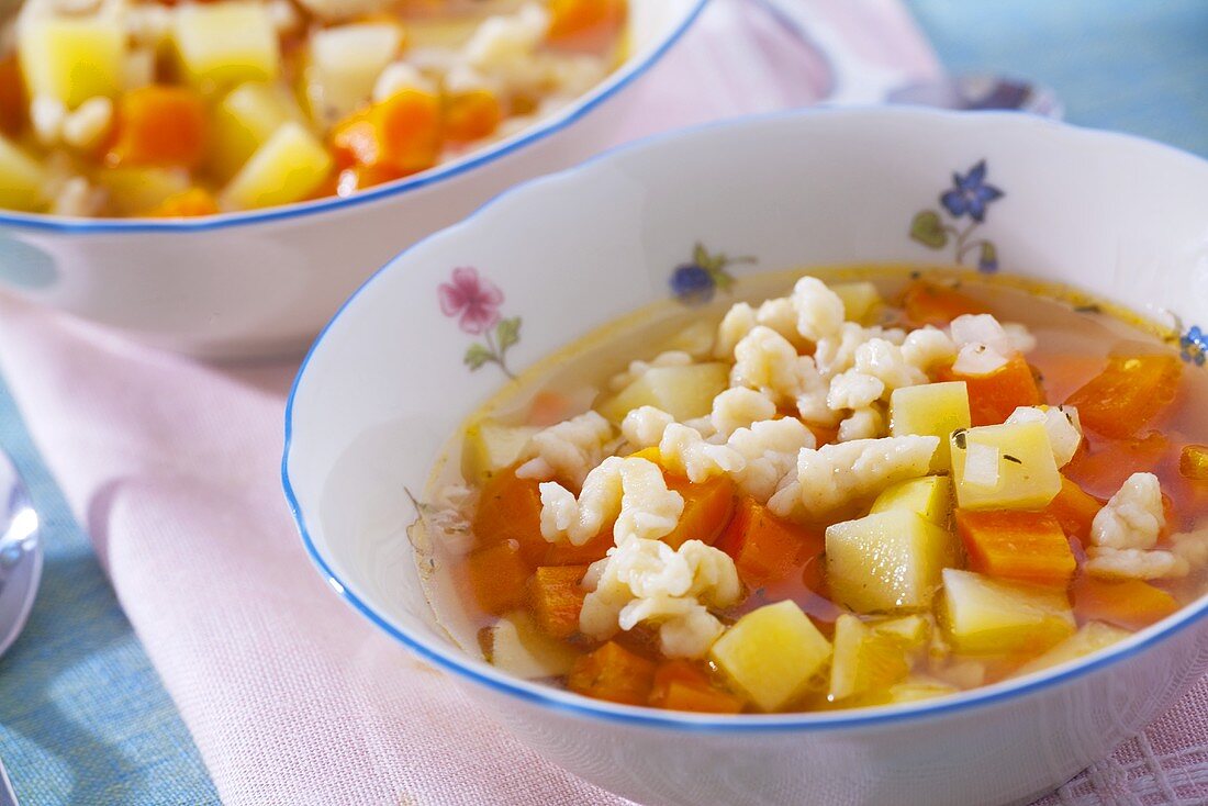 Potato and carrot soup with spaetzle noodles