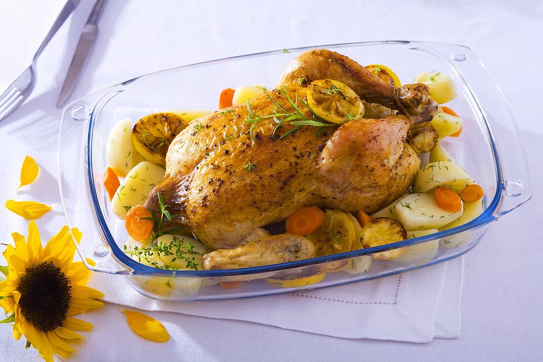 Stuffed chicken with vegetables and lemon slices
