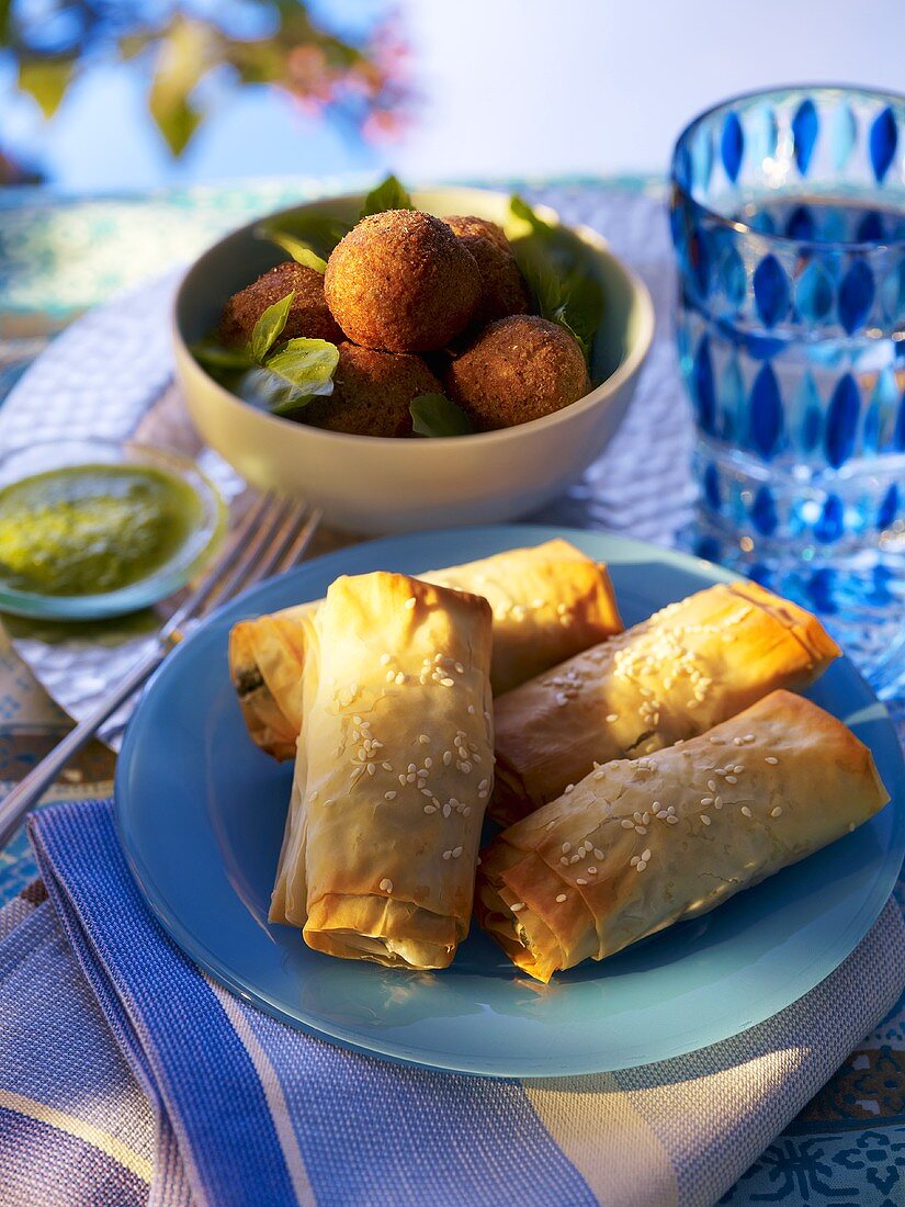 Keftedes and spinach rolls